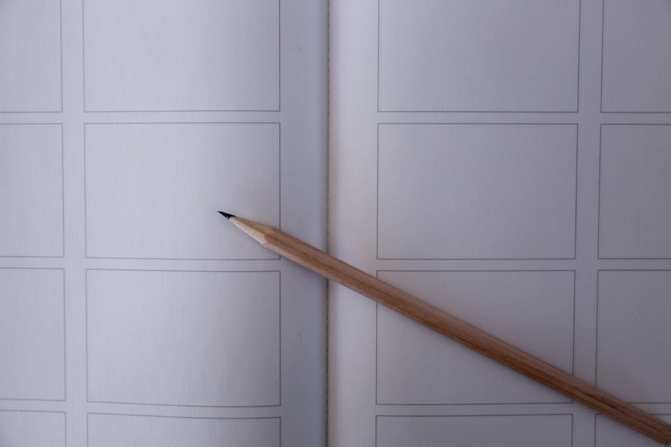 Close-up view of architectural sketches on paper atop a marble desk, showcasing design concepts.